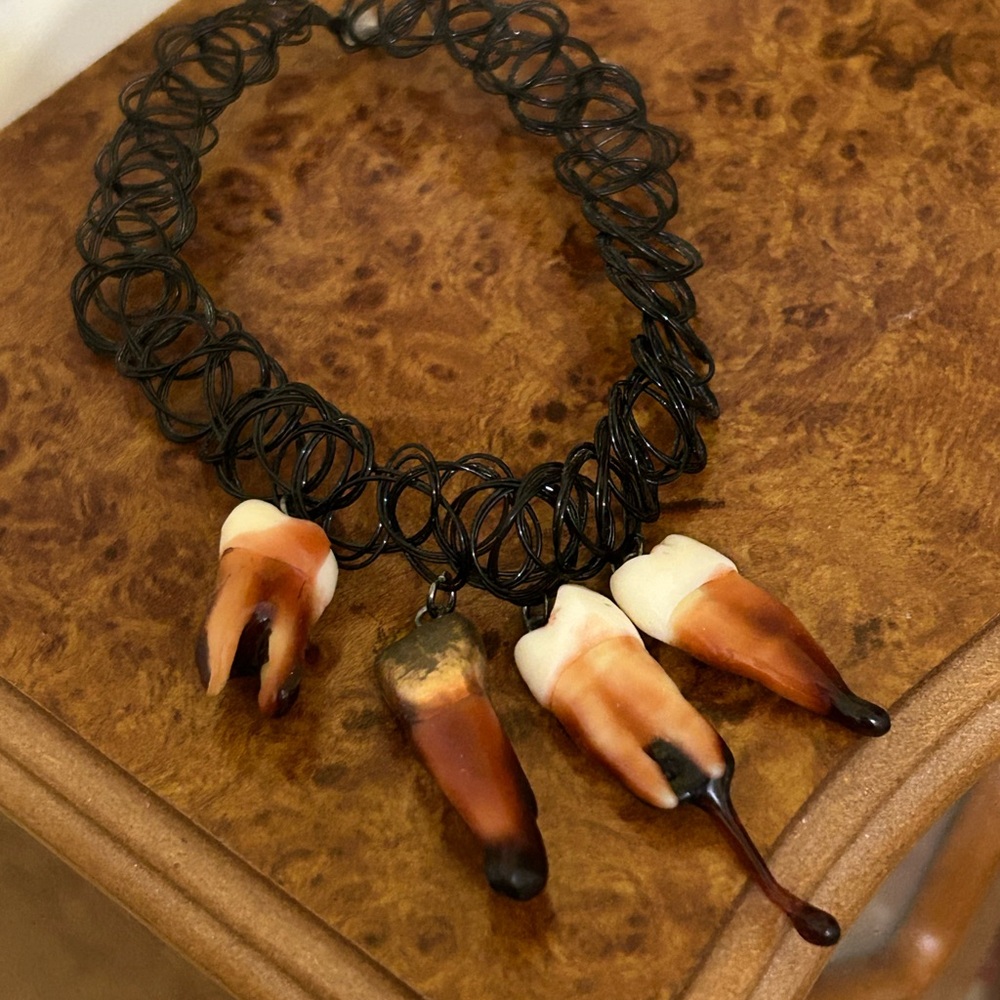 Unique Dangling Teeth Tattoo Choker